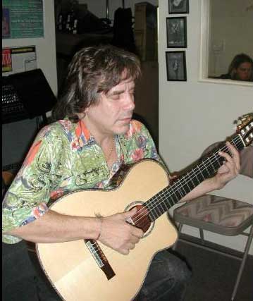 Feliciano playing guitar